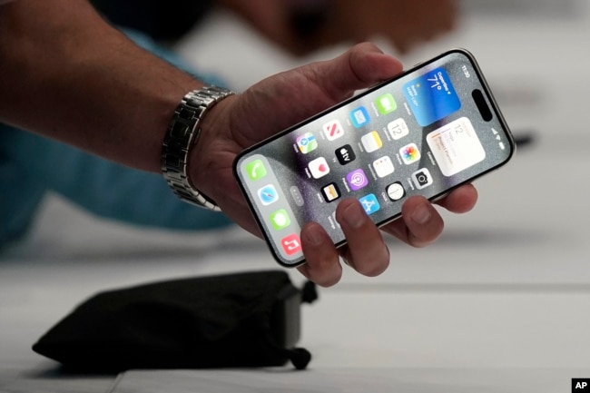 FILE - The iPhone 15 Pro is shown after its introduction on the Apple campus, Sept. 12, 2023, in Cupertino, Calif. (AP Photo/Jeff Chiu, File)