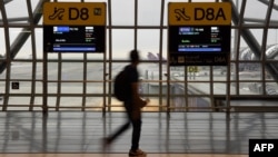 A l'aéroport de Bangkok, le 25 juillet 2016.