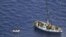 Illegal immigrants are seen on a sailboat near island of Mljet, southern Croatia, Monday, July 2, 2012.