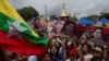 Supporters of Myanmar State Counselor Aung San Suu Kyi react while listening to her speech to the nation over Rakhine and Rohingya situation in Yangon, Myanmar, Sept. 19, 2017.