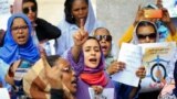 Women chant slogans during a demonstration calling for the repeal of family law in Sudan, on the occasion of International Women's Day, outside the Justice Ministry headquarters in the capital Khartoum on March 8, 2020.