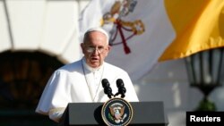 Pope Francis speaks during a ceremony welcoming him to the White House in Washington, Sept. 23, 2015. 