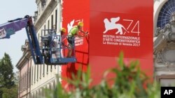 Final preparations are made at the cinema palace ahead of the 74th Venice Film Festival, in Venice, Italy, Aug. 29, 2017.