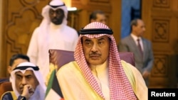 FILE - Kuwait's then-foreign minister, now prime minister, Sheikh Sabah al-Khalid al-Sabah attends the Arab League's foreign ministers' meeting in Cairo, Egypt, Apr. 21, 2019. 