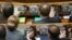 FILE - Ukrainian lawmakers vote during a parliament session in Kyiv, Ukraine, Feb. 7, 2019.