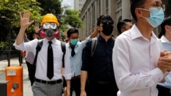 Hong Kong braces for more protests as face masks banned