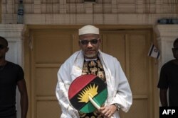 FILE - Political activist and leader of the Indigenous People of Biafra movement, Nnamdi Kanu is seen outside his house in Umuahia, southeast Nigeria, May 26, 2017.