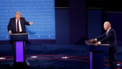 U.S. President Donald Trump and Democratic presidential nominee Joe Biden participate in their first 2020 presidential campaign debate in Cleveland