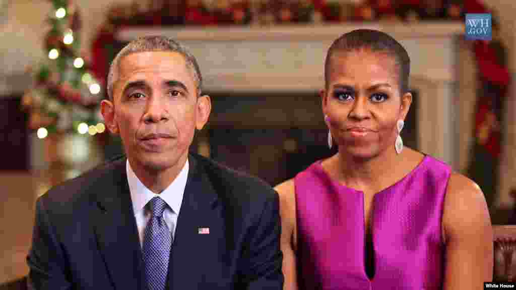 President Obama and first lady Michelle Obama wished Americans a Merry Christmas and Happy Holidays, and thanked U.S. troops for their service, Thursday, December 25, 2014