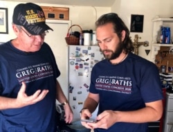 Republican Challenger Greg Raths meets with his Campaign Manager Blake Allen to plan door-to-door canvassing in California’s 45th District.