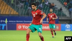 Morocco's Walid El Karti runs with the ball during the African Nations Championships (CHAN) football match between Morocco and Rwanda at Stade de la Reunification in Douala, Cameroon, on Jan. 22, 2021. 