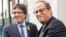 Former Catalan leader Carles Puigdemont, left, and current regional president of Catalonia Quim Torra before a meeting with government ministers and ministers in exile at the Government Delegation of Catalonia to the European Union in Brussels, July 28, 2