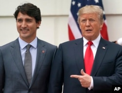 Presiden Donald Trump dan Perdana Menteri Kanada Justin Trudeau di Gedung Putih di Washington, pada 11 Oktober 2017. (Foto: AP)