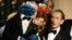 FILE - Bob McGrath, right, looks at the Cookie Monster as they accept the Lifetime Achievement Award for '"Sesame Street" at the Daytime Emmy Awards on Aug. 30, 2009, in Los Angeles.