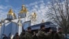 Soldiers carry the coffin of Polish volunteer soldier Filip Antosiak,18, who served in the Ukrainian army and was killed in the Russia-Ukraine war, during a ceremony in Kyiv, Ukraine, Jan. 30, 2025. 