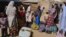 Families from Gwoza, Borno State, displaced by the violence and unrest caused by the insurgency, are seen at a refugee camp in Mararaba Madagali, Adamawa State, Feb. 18, 2014.