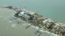 An aerial view shows devastation after Hurricane Dorian hit the Abaco Islands in the Bahamas, Sept. 3, 2019, in this still image from video obtained via social media.