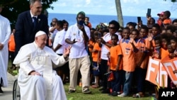 Pope Francis attends a meeting with students in Baro, Papua New Guinea, on Sept. 8, 2024.