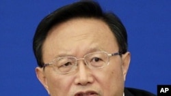 China's Foreign Minister Yang Jiechi answers a reporter's question in Beijing, March 7, 2011