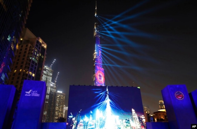 FILE - A laser show celebration is put on ahead of a live broadcast of the Hope Probe attempting to enter the Mars orbit as a part of Emirates Mars mission, in Dubai, United Arab Emirates, Feb. 9, 2021. (AP Photo/Kamran Jebreili)