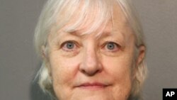 FILE - This January 2018, file photo provided by the Chicago Police Department shows Marilyn Hartman, who added this month to her arrest record for sneaking onto planes after what police say was a ticketless flight from Chicago to London has been ordered released from jail, a judge said Thursday, Jan. 25, 2018.