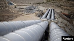 The Hinds pumping plant, last of five major pumping stations along the Colorado River Aqueduct, in Hayfield Lake, California, May 18, 2015. The gravity system plant pumps water coming from Lake Havasu to the top of a hill, to supply Southern California.