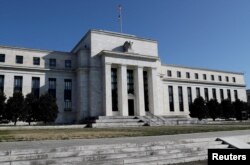 Gedung bank sentral AS, Federal Reserve, di Washington, 19 Maret 2019. (Foto: Leah Mills/Reuters)