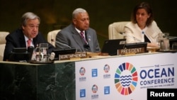 Secretary General of the United Nations Antonio Guterres (L) speaks at the opening of The Ocean Conference at the United Nations in New York, June 5, 2017. 