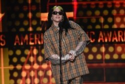 Billie Eilish introduces a performance by Green Day at the American Music Awards, at the Microsoft Theater in Los Angeles, California, Nov. 24, 2019.