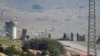 Israeli soldiers stand guard at a checkpoint where the military said an attacker fired at an army base near the village of Tayasir in the northern West Bank, Feb. 4, 2025. 