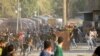 Supporters of Iraqi populist leader Moqtada al-Sadr protest inside the Green Zone, in Baghdad