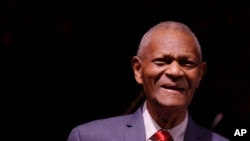 FILE - Legendary pianist McCoy Tyner looks to the audience after performing at the Botanical Garden Città Studi, in Milan, Italy, July 6, 2017.