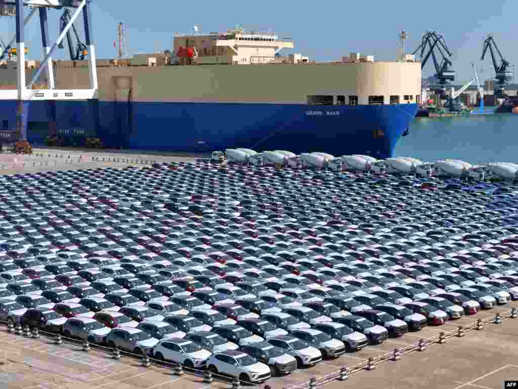 Cars for export are seen at a port in Yantai, China&#39;s eastern province of Shandong.