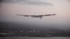 FILE - The Solar Impulse 2 airplane, flown by test pilot Markus Scherdel, flies off the coast of Oahu during a test flight from Kalaealoa Airfield in Kapolei, Hawaii, March 3, 2016.