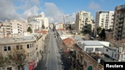 An aerial view shows the tracks of the light rail as Israel tightened a national stay-at-home policy with guidelines aimed at halting the spread of the coronavirus which would now be enforced by police under emergency orders, in Jerusalem, March 22, 2020.