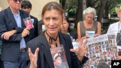 Catherine Berthet, whose daughter Camille Geoffrey died in the March 2019, crash of an Ethiopian Airlines 737 Max, speaks outside federal court in Fort Worth, Texas, on Oct. 11, 2024.