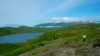 FILE - This July 8, 2021, photograph shows a hiker en route to Lake Bonnie Rose, one of many scenic hiking options on Adak Island, Alaska, where on Nov. 5, 2024, one of its residents will be the last American to cast an in-person ballot for president.