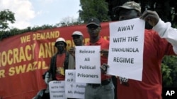 People demonstrate outside the embassy of Swaziland in Pretoria on April 12, 2011 to support planned protests against the rule of King Mswati III.