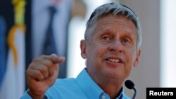 FILE - Libertarian presidential candidate Gary Johnson speaks at a campaign rally in Boston, Massachusetts, Aug. 27, 2016. 