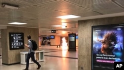 A man blows up an explosive device in the station in Brussels, Belgium, June 20, 2017. The man was shot by soldiers afterwards in what prosecutors are treating as a "terrorist attack." 