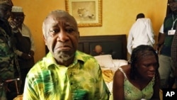 Ivory Coast President Laurent Gbagbo and his wife, Simone, in a room at Hotel Golf in Abidjan after they were arrested, April 11, 2011. 