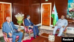 Djibouti's President Ismael Omar Guelleh receives leader of Sudan's paramilitary Rapid Support Forces (RSF) General Mohamed Hamdan Dagalo, at the Presidential Palace in Djibouti city