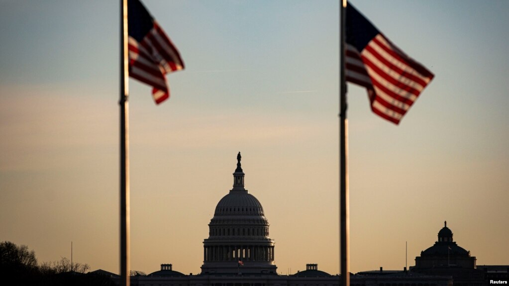 The U.S. Capitol is pictured as the sun rises in Washington, Dec. 15, 2020. 