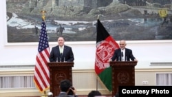 Afghan President Ashraf Ghani (right), and U.S. Secretary of State Mike Pompeo speak at a joint press conference at the Presidential Palace, in Kabul, Afghanistan, July 9, 2018.