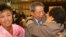 South Korean Min Ho-Sik, center, 84, hugs his North Korean relative Min Eun-Sik, right, 81, during a reunion meeting of family members separated after the Korean War at the Mount Kumgang resort on the North's southeastern coast, Oct. 20, 2015. 