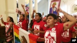 Demonstrators rally in the Texas Capitol, May 29, 2017, protesting the state's newly passed anti-sanctuary cities bill, in Austin, Texas.