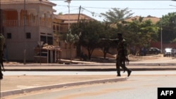 A soldier patrols the government palace area in Bissau, capital of Guinea-Bissau, Feb. 1, 2022. 