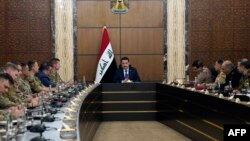 محمد شیاع السودانی نخست وزیر عراق در نشست مقامات نظامی عراق و ائتلاف بین المللی در بغداد - ۲۷ ژانویه ۲۰۲۴ 