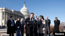 Former Chinese political prisoner and leading human rights activist Wei Jingsheng speaks to the press alongside U.S. Congressmen and human rights groups in front of the U.S. Capitol Building in Washington, Jan. 14, 2010.