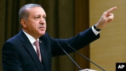 Turkish President Recep Tayyip Erdogan speaks during an event for foreign investors in Ankara, Aug. 2, 2016. He again blasted unnamed Western countries that he said supported an attempted coup July 15.